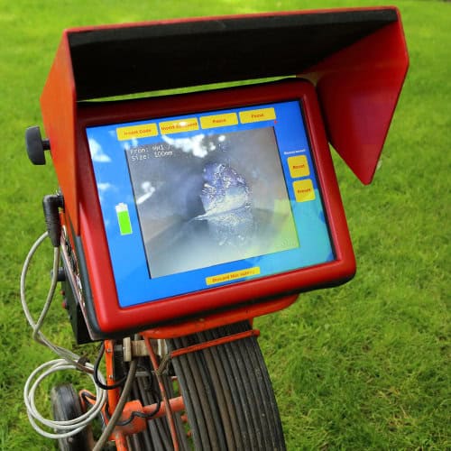 A drainage engineer doing a CCTV drain survey