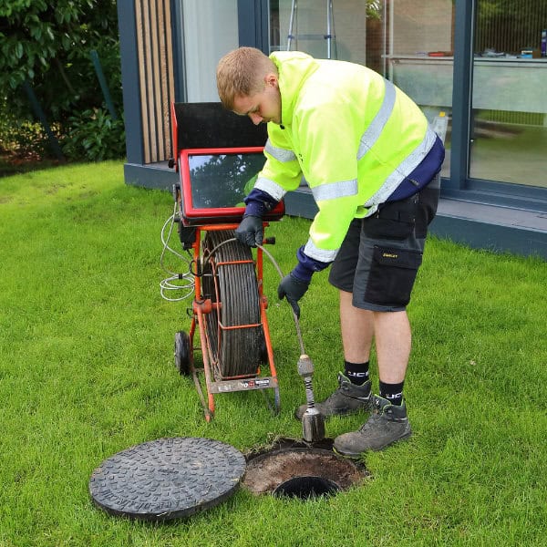A drainage expert starting a CCTV drain survey